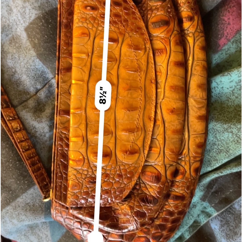 Brahim 8-1/2 by 4-1/2 rust-colored wristlet